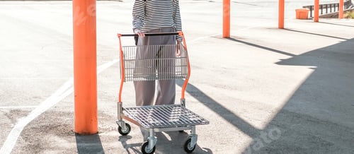Preview: Black Friday. A woman in a store picking out clothes, the season of discounts and sales. A day of me