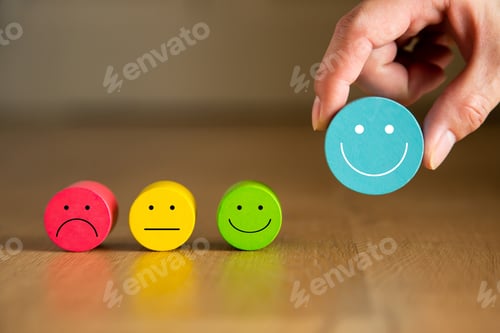Preview: Colorful Mood Faces on a Wooden Table