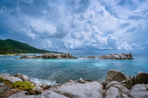 Preview: Tropical island landscape of beautiful beach with impressive clouds, Anse Marron, La Digue