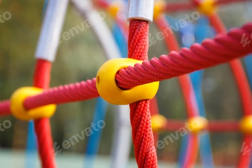 Preview: Red rope as mesh for climbing on playground