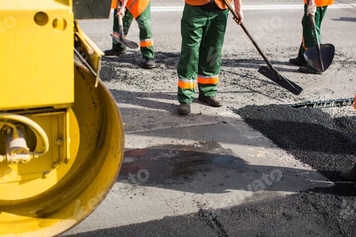 Preview: Workers on Asphalting paver machine during Road street repairing works.