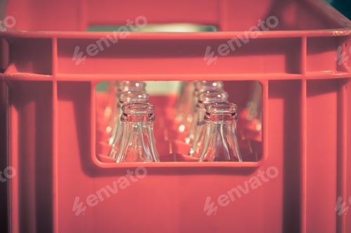Preview: Red Plastic Crate with Empty Glass Bottles
