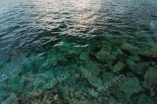 Preview: Aerial view over rocks landscape and blue sea in Greece