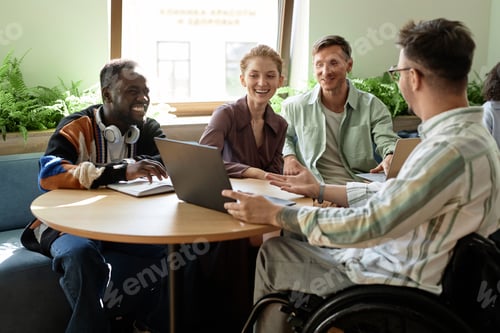 Preview: Businessman showing presentation to his colleagues