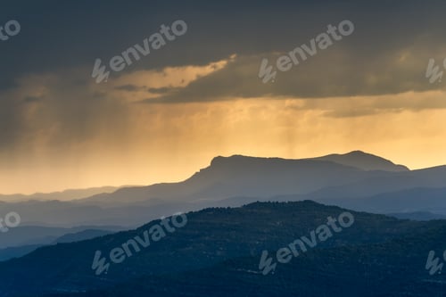 Preview: Sunset over mountains peaks