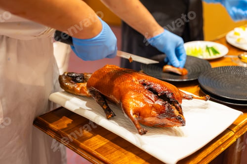 Preview: Chef prepare the peking duck in restaurant