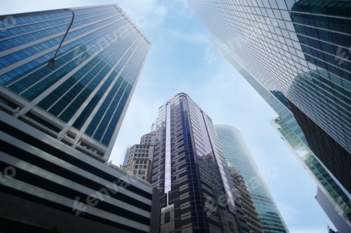 Preview: low angle view of singapore city buildings.