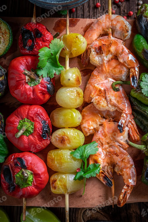 Preview: Hot roasted skewer with vegetables and seafood.