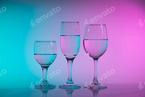 Preview: Wine glasses with neon multicolor light
