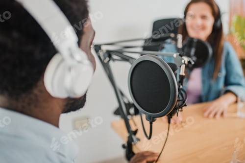 Vista previa: black man recording podcast with Woman
