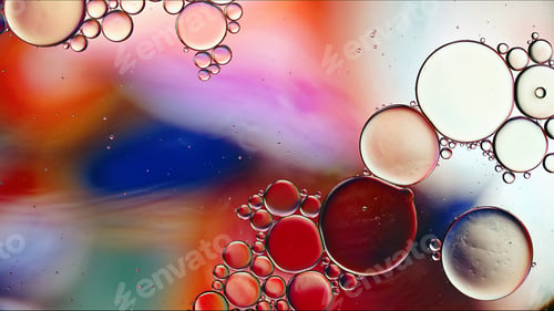 Preview: Abstract Colorful Food Oil Drops Bubbles and spheres Flowing on Water Surface