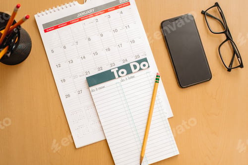 Preview: Todo book on top of a calendar showing the month of January