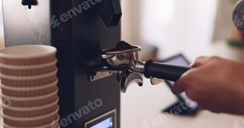 Preview: Coffee machine, barista hand and grind beans in cafe, closeup and prepare latte or espresso drink w