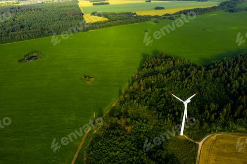 Preview: Windmills on the background of forests and fields. Windmill in nature.Belarus