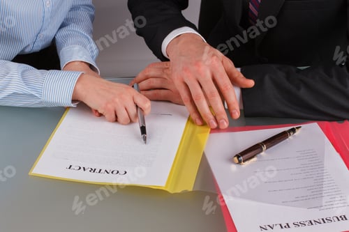 Preview: Business negotiation at office. Business people discussing contract.