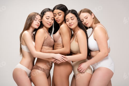Preview: five multiethnic dreamy girls with closed eyes hugging and leaning on each other isolated on grey,