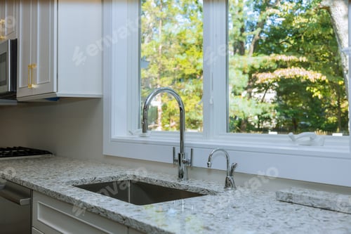 Preview: Interior of modern kitchen with all appliances on stove top