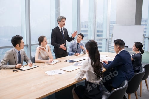 Preview: Business people having meeting in board room