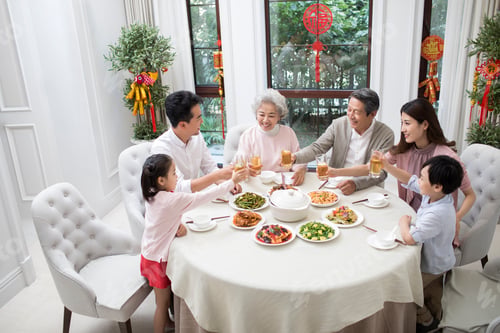 Preview: Happy family having Chinese New Year dinner