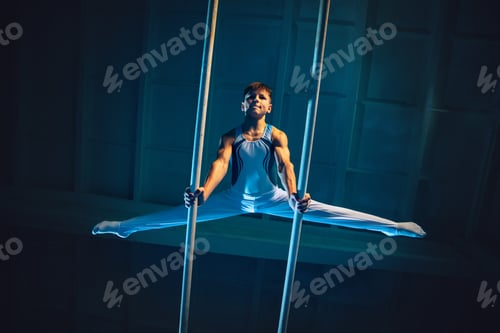 Preview: Little male gymnast training in gym, flexible and active