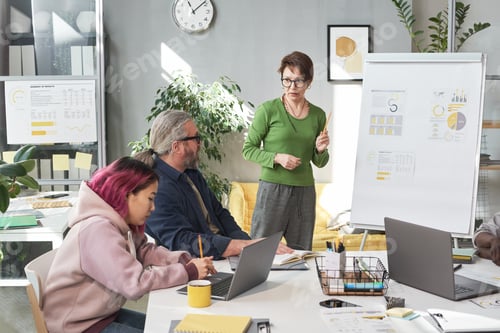 Preview: Business people at presentation