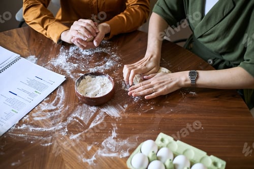 Preview: Adult Women Kneading Dough during Home Baking Workshop