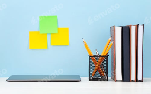 Preview: Studio workspace with laptop computer and office supplies