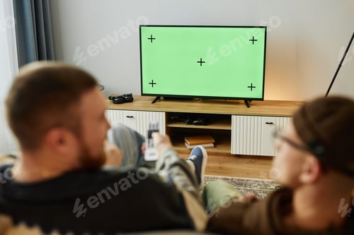 Preview: Back View Two Friends Watching TV