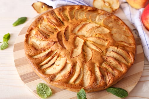 Preview: Apple taten on paper with honey and mint