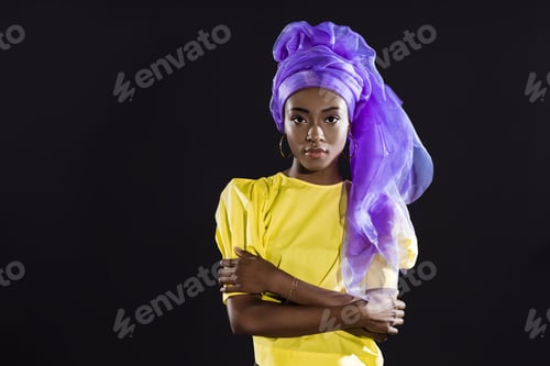 Preview: young african american woman in stylish vintage clothing isolated on black