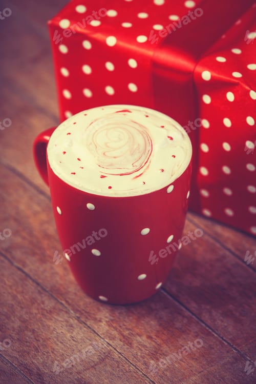 Preview: Cup of coffee with gift