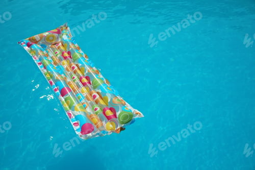 Preview: Colorful inflatable mattress floating in swimming pool on sunny day. Space for text
