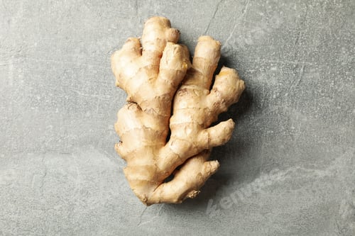 Preview: Fresh raw ginger on gray background, space for text
