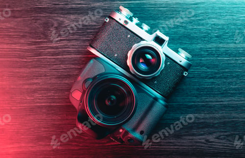 Preview: Old and new camera. Concept of technology progress. Blue and red light