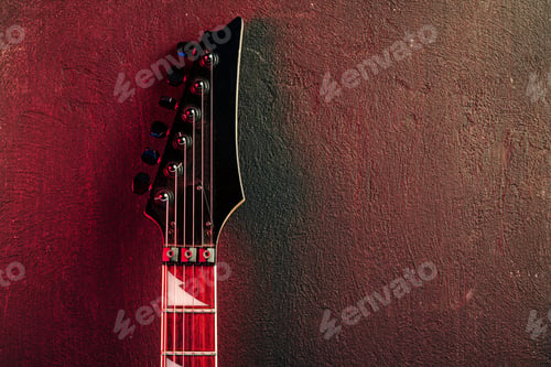 Preview: Guitar headstock with tuners on dark background
