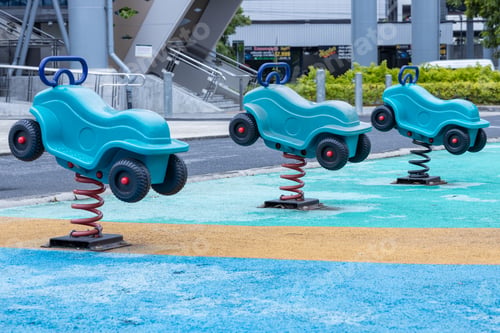 Preview: Colorful Playground with Slides and Swings in Park