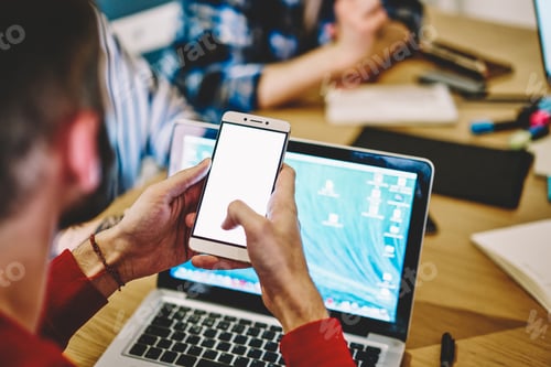 Preview: man typing messages on modern mobile phone in chat