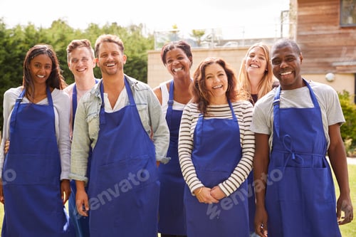 Preview: Group Portrait Of Men And Women Attending Cookery Class Relaxing Outdoors