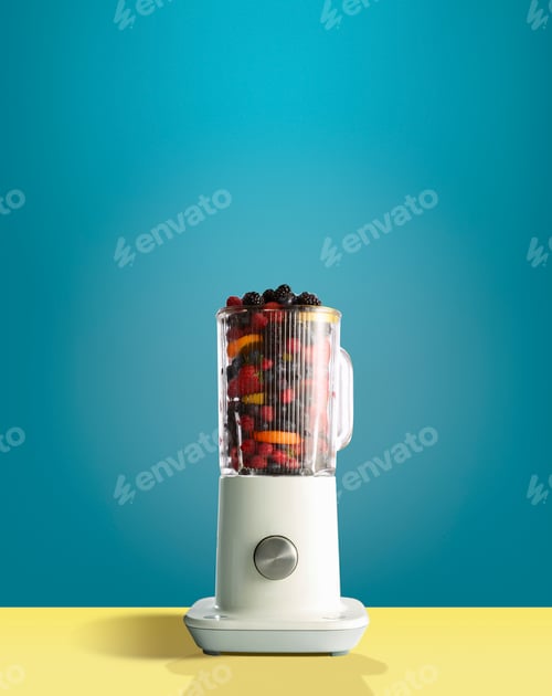 Preview: Fresh berries and citrus fruit in juicer