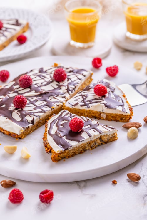 Preview: Homemade flat carrot cake with nuts, iced with cream cheese and carrot juice