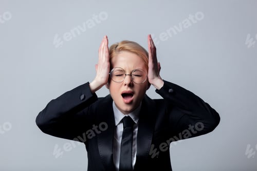 Preview: Crying businesswoman in a business suit