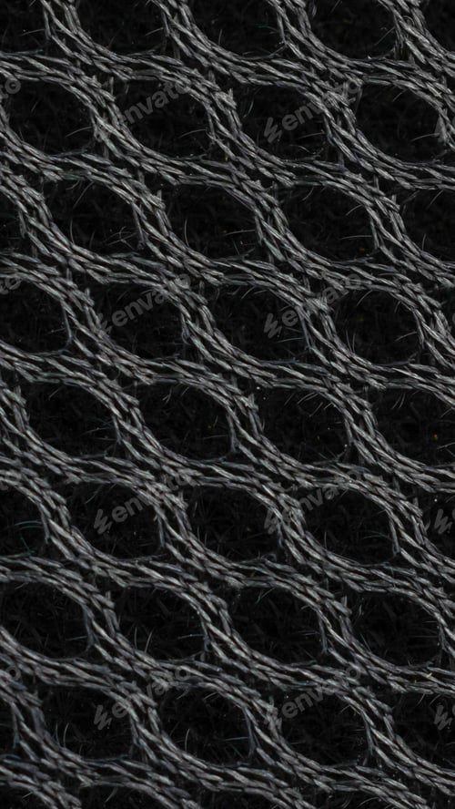 Preview: black cotton fabric with a mesh pattern for visible details. background