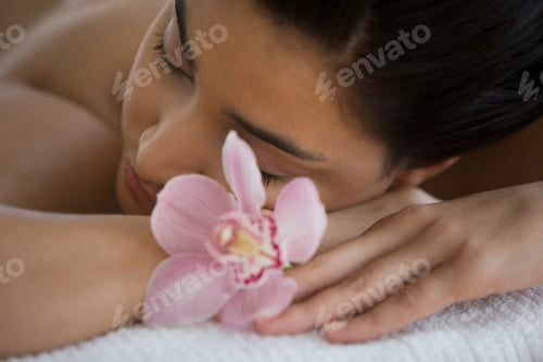Preview: A serene moment of relaxation with a delicate touch of floral beauty