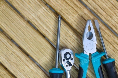 Preview: set of tools on a wooden background.