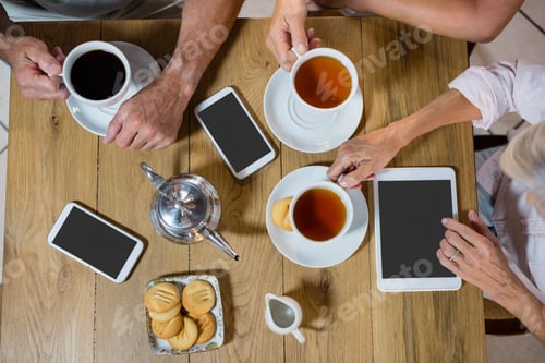 Preview: Group of senior friends having coffee
