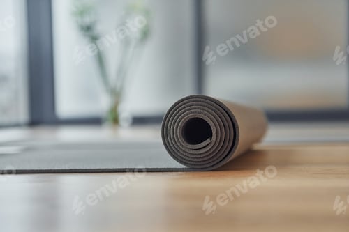 Preview: Close up detailed view of fitness mat that lying down on the floor