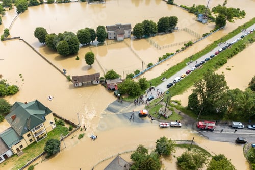 Preview: Aerial view of flooded houses and rescue vehicles saving people in Halych town, western Ukraine.