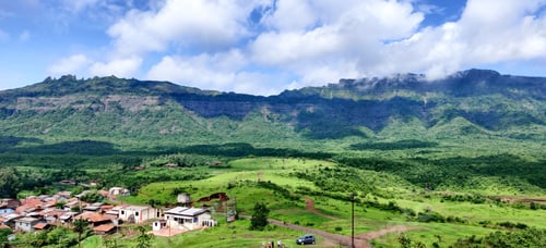 Preview: Small village with mountains in the background