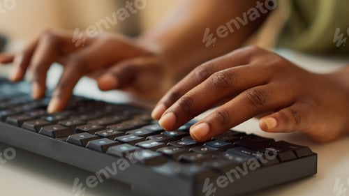 Preview: Manager typing data report on computer