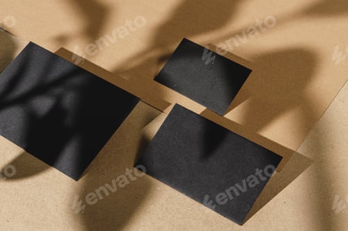 Preview: Black business cards on cork board table